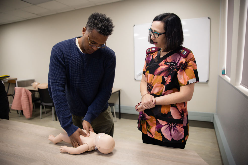 Soli Deo Gloria Bella First Aid Class Adele teaching man